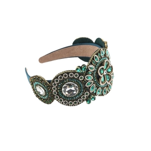 Serre-tête baroque en velours vert avec cristaux d'émeraude et motifs floraux en strass brillants