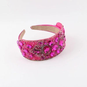 Baroque style wide headband with pink crystals and beads on a satin base for party wear