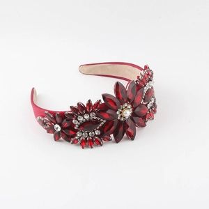 Luxury red crystal headband with rhinestone floral patterns and satin padding on white background