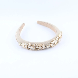 Close-up of luxury Baroque headband with sparkling champagne crystals and rhinestones