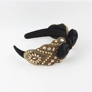 Luxury black velvet headband with studded bow, rhinestones and golden rivets