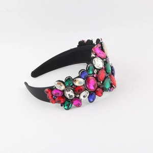 Close-up of Baroque headband featuring colorful large rhinestones and luxury vintage gems