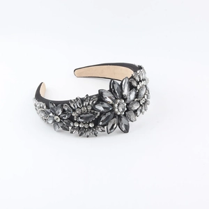 Fashion wide headband with grey and white rhinestones forming floral patterns