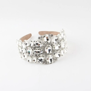 Baroque wide headband featuring sparkling crystal rhinestones on a white fabric base