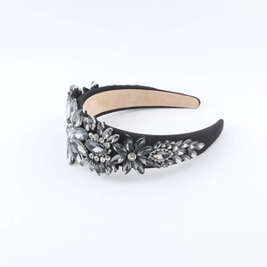 Luxurious wide rhinestone headband with vintage floral crystal patterns on black fabric