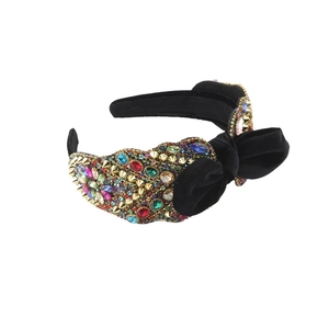 Baroque black velvet headband with colorful rhinestones, golden rivets and a bow