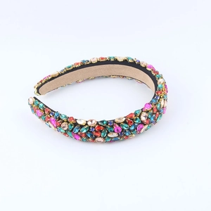 Baroque wide headband with colorful rhinestones and bohemian style on a white background