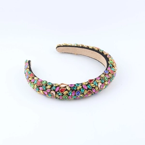 Close-up of handmade baroque headband featuring colorful water-drop rhinestones and gold alloy