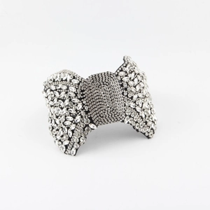 Baroque style bow headband with full sparkling rhinestones on a white background