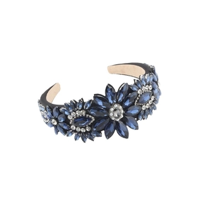 Elegant floral headband with deep blue rhinestones and white pearls on black base