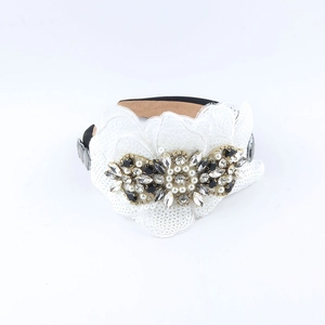 Vintage Baroque wide headband with white sequins, pearls, and rhinestones on white background