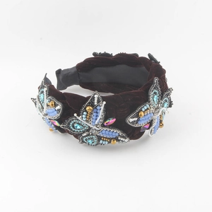 Cerchietto in velluto bordeaux con farfalle di perline blu e decorazioni in strass