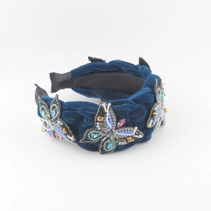 Cerchietto in velluto intrecciato blu scuro con farfalle di cristallo fatte a mano