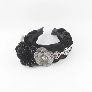 Fashion velvet headband featuring black fabric roses and crystal camellia floral embellishments