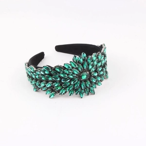 Baroque style wide headband with emerald green crystals and luxury padded velvet finish