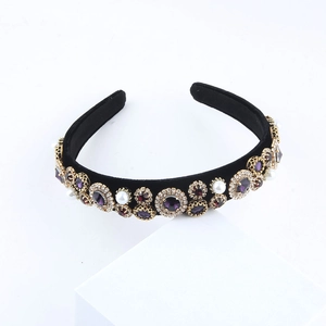 Baroque padded headband with purple gemstones and pearls on black velvet base