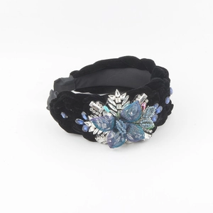 Braided black velvet headband with luxury blue rhinestone floral embellishment
