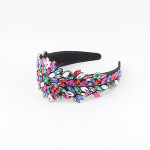 Detailed macro view of colorful rhinestones on a wide baroque-style headband