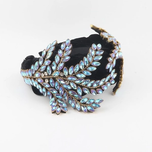 Baroque style velvet headband featuring luxury blue-purple marquise crystals leaf design