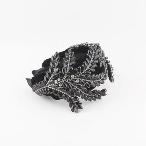 Detailed view of Baroque headband with black marquise crystals and fabric base