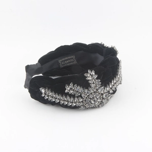 Luxurious black velvet braided headband with sparkling grey crystal leaf patterns