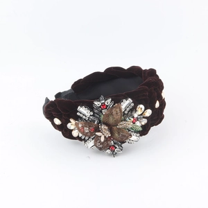 Brown velvet twisted headband with sparkling floral rhinestone and crystal embellishments
