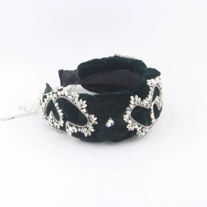 Deep green velvet braided headband with sparkling rhinestone heart design for women