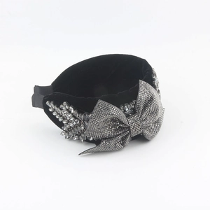 Luxury black velvet headband with sparkling rhinestone bow and crystal embellishments