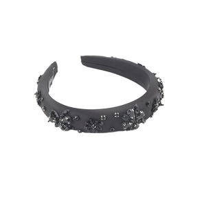 Elegant black padded headband with handmade floral beadwork and sparkling sequins