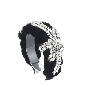 Elegant black velvet headband with luxury sparkling rhinestone patterns for high-end styling