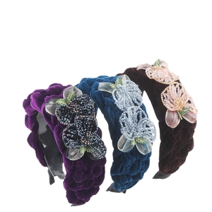 Three velvet braided headbands with handmade crystal floral beads on white background