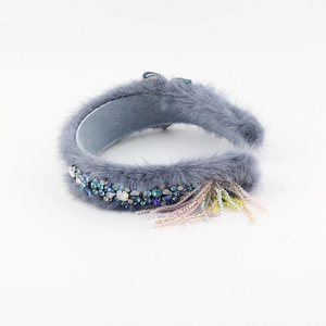 Elegant grey faux fur padded headband with colorful rhinestones and floral gem clusters
