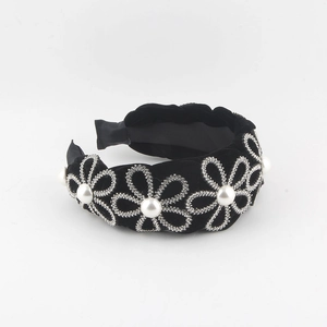 Fashionable black velvet headband with sparkling rhinestone snowflakes and white pearls