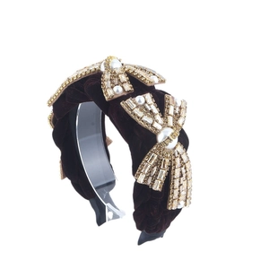 Luxury velvet headband with braided texture and pearl crystal bow decoration