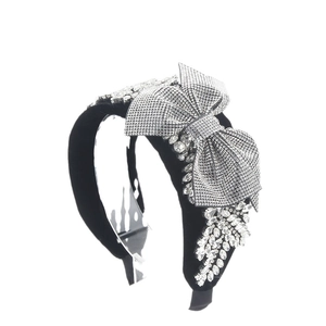 Elegant black velvet headband with luxury rhinestone bow and marquise crystal details