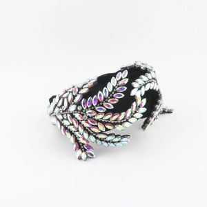 Detail of baroque black velvet headband with AB color marquise rhinestones design