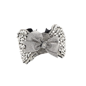 Luxury black velvet headband with oversized bow and shimmering rhinestones for women