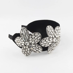 Baroque black velvet sponge headband with two large crystal-encrusted flower ornaments