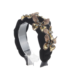 Fashion velvet headband with intricate crystal butterfly motifs on a wide black band