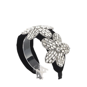 Baroque black velvet sponge headband featuring two large sparkling rhinestone flowers
