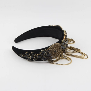 Baroque style wide headband with black velvet, rhinestones and gold chains in 45-degree view