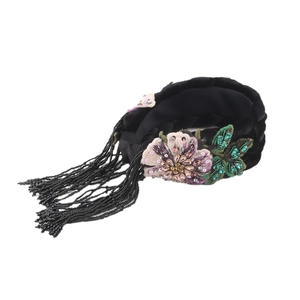 Velvet headband with embroidered flowers and cascading black crystal tassel fringe