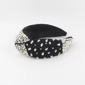 Luxe black velvet headband with hand-sewn crystals and elegant twisted knot design