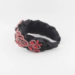 Serre-tête tressé noir élégant avec fleurs en cristal rouge et strass de luxe