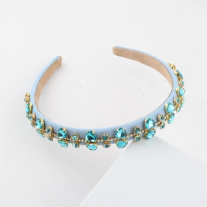 Elegant light blue baroque headband with sparkling rhinestones and gold metal claw settings