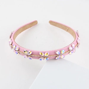Pink fabric headband with sparkling crystal flowers and golden rhinestone chain detail