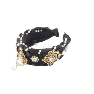 Baroque black woven headband with white pearls, golden floral metal, and rhinestones