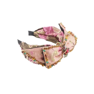 Pink jacquard wide headband featuring large bow with rhinestones and vintage gemstones