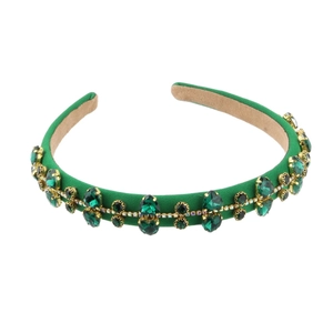 Luxury green baroque headband with emerald rhinestones and gold claw setting detail