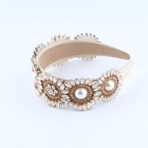 Serre-tête baroque tournesol avec cristaux et perles sur base en velours beige